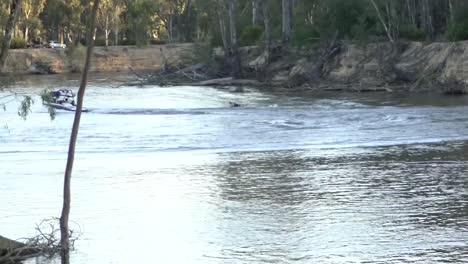 Outdoor-nature-tubing-behind-speed-boat-river-adventure