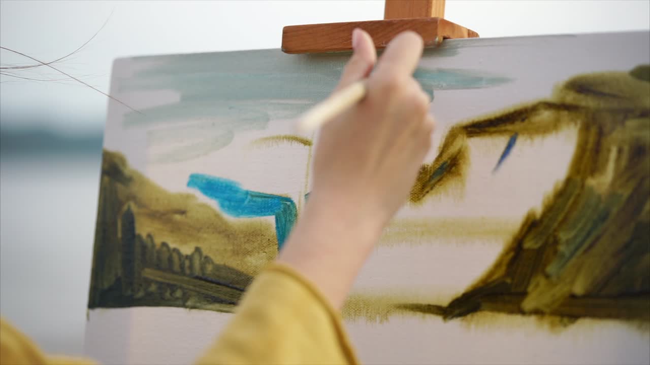 An artist painting a landscape