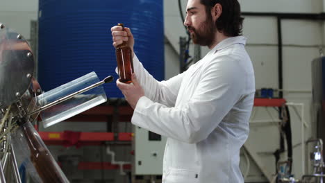 man tasting beer at brewery