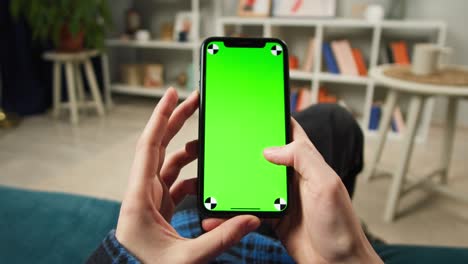 woman using phone with chroma green screen, vaccination passport with qr code, international coronavirus covid 19 vaccine certificate on mobile device, green zone. high quality 4k footage