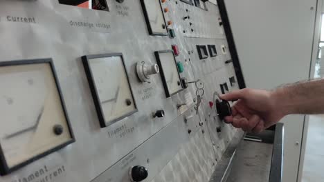An engineer man or worker, people&#039;s hand Twisting knobs and pushing buttons