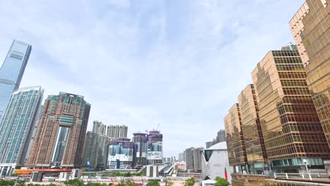 buildings and cranes by the waterfront in hong kong