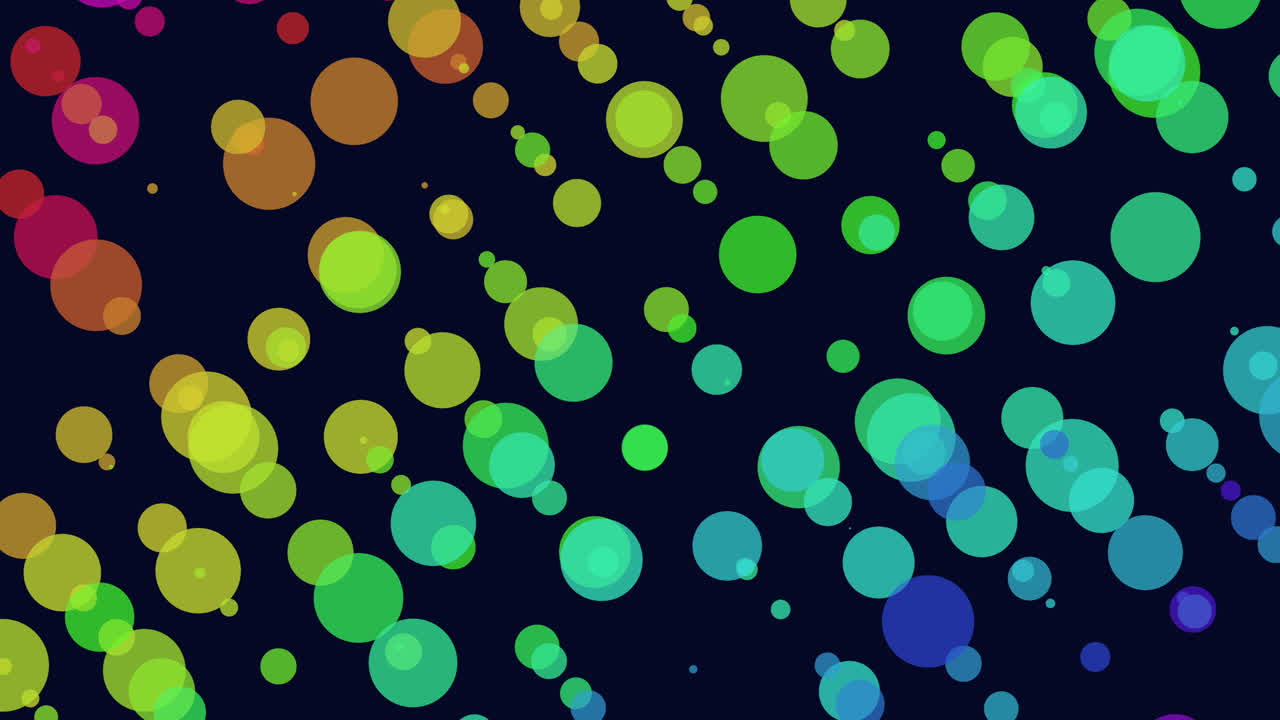 A vibrant and dynamic display of multicolored circles set against a sleek black backdrop. The circles are assorted in a seemingly random fashion