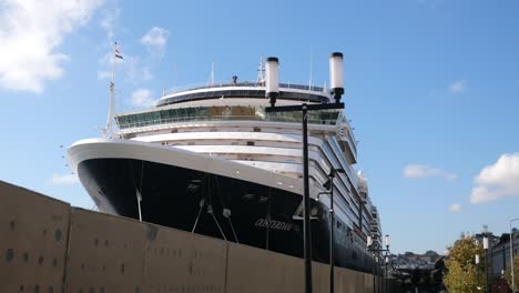 cruise ship docked at a port