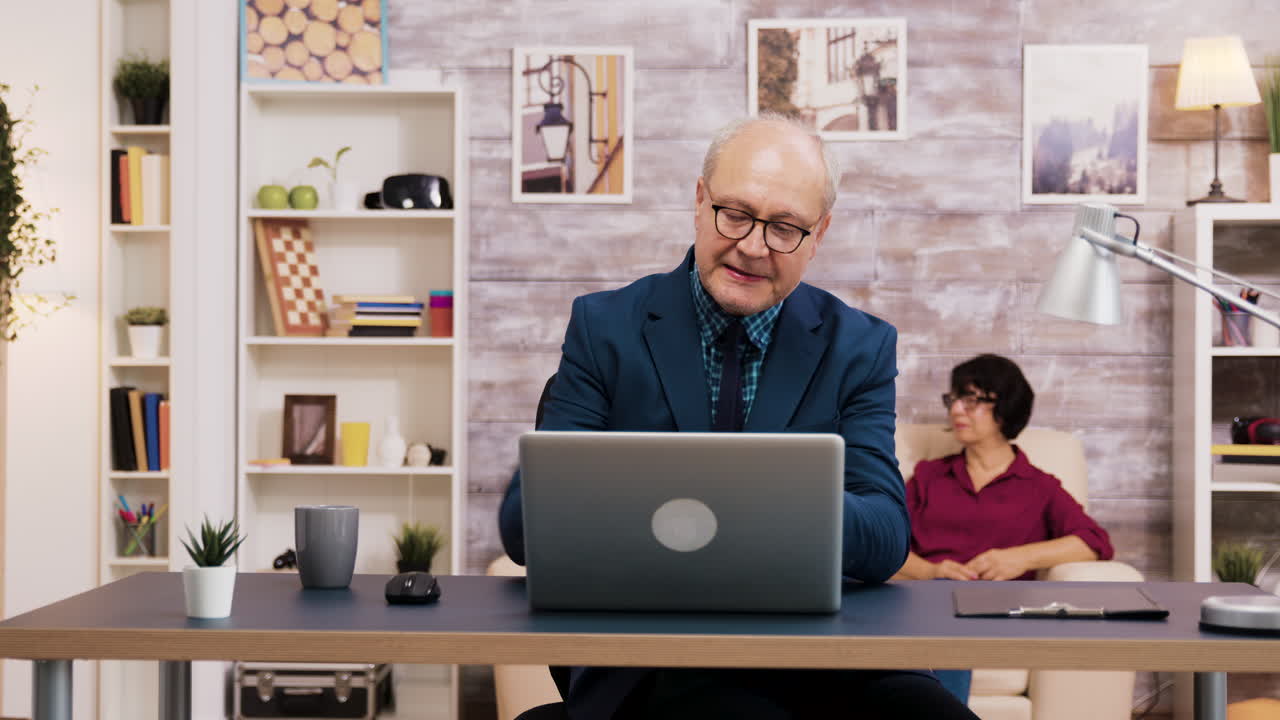 Man working on laptop in office