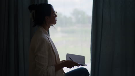 silhouette of pensive businesswoman looking for inspiration