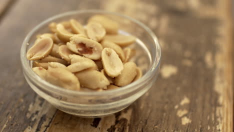 Salted peanuts in small bowl