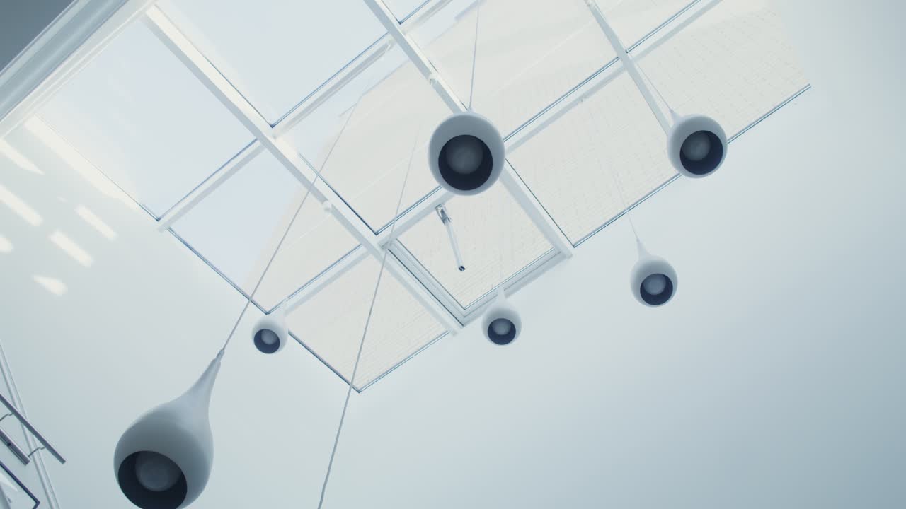 Modern Interior Design with Skylights and Pendant Lighting