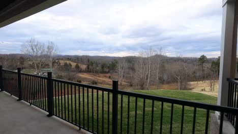 walking onto the back porch of a house in the hills of tennessee