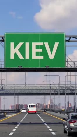 highway sign to kiev with airplane in the sky