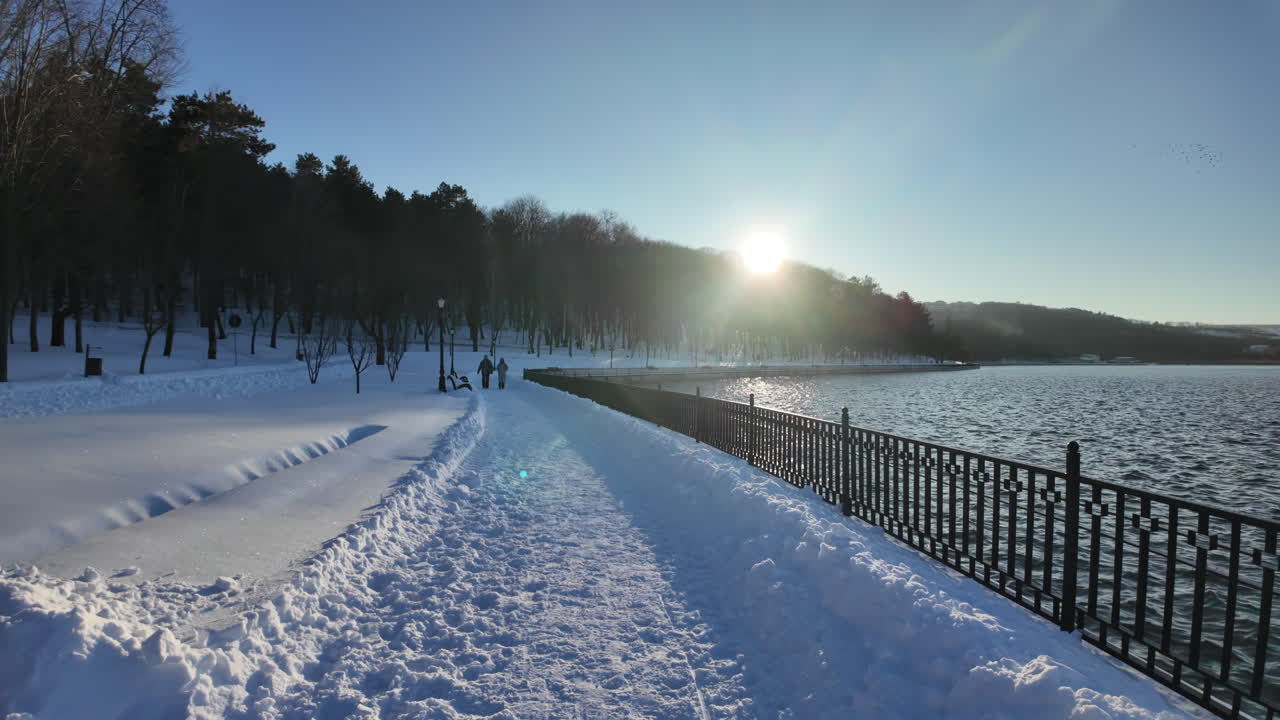 Valea Morilor lake and park covered in white snow in winter in Chisinau, Moldova