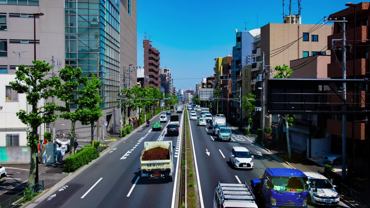 도쿄의 도시 거리에서 교통 체증의 타임 스 긴