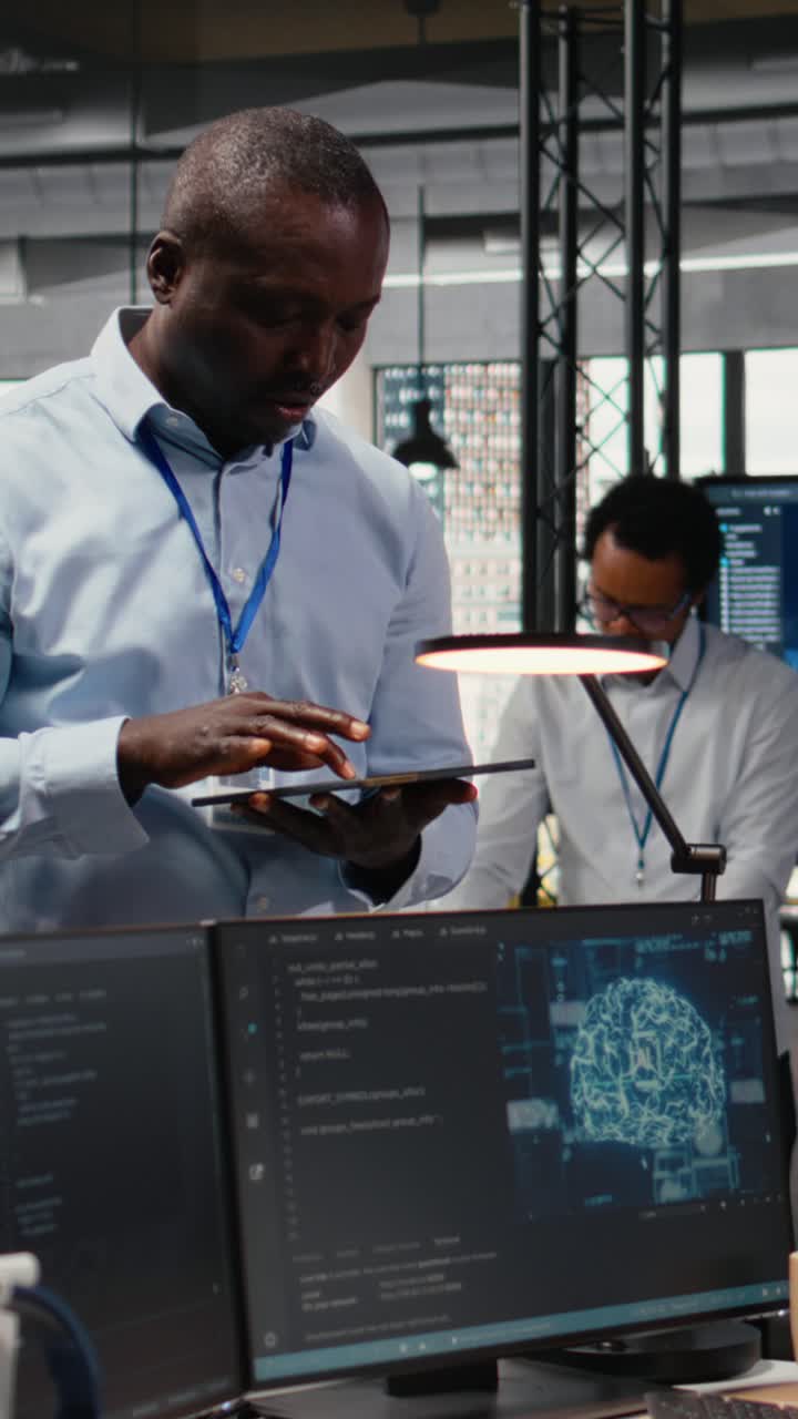 Vertical video Manager talking with engineer in office automating workflows using AI