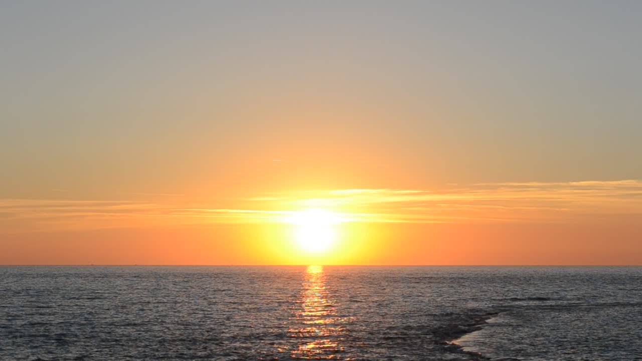 Sunset over the Atlantic Ocean. Chipiona, the city in Andalusia, Spain