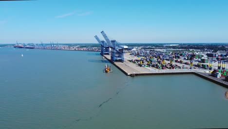 high drone view of harwich seaport with stately hoist cranes on the forsaken landing