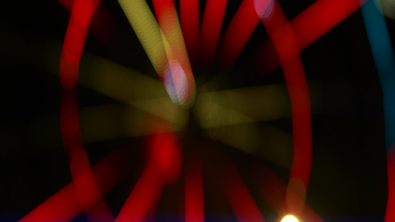 Christmas bokeh neon blinking colorful lights, holiday dark abstract background