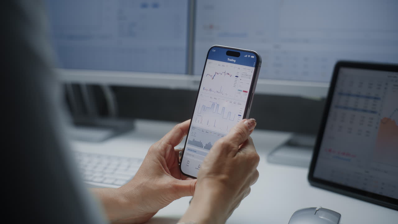 Female Stock Exchange Broker Monitoring Real-Time Stocks, Exchange Market Charts on Computer with Multi-Monitor Desktop Setup. Professional Investment Agent Working in Financial Agency Office at Night