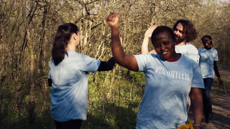 Activists-congratulating-each-other-with-a-high-five-after-a-successful-teamwork