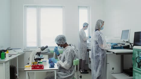 medical laboratory staff conducting blood tests and analyses