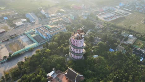 4k red dragon temple at a highway at dawn