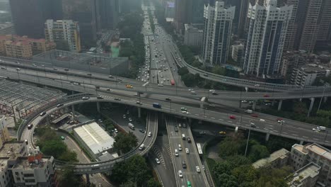 day time guangzhou city center traffic street road junction aerial topdown panorama 4k china