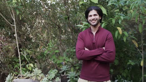 portrait on happy caucasian man in nature, copy space, slow motion