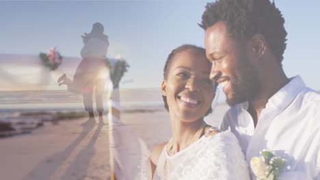 animación de una feliz pareja afroamericana sobre una pareja bailando en la playa