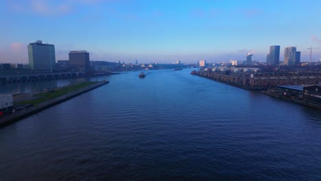 revealing amestardam downtown over the north sea canal at the sunset