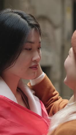 two women showing affection