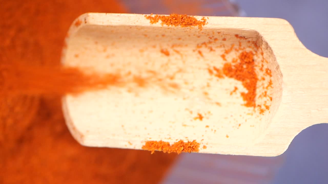 Wooden Spoon with Red Chili Powder
