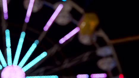 carnival fair grounds at night. defocused footage.