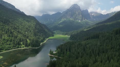 other worldly scene of lake obersee nsetled in switzerland alpine forests and mountains