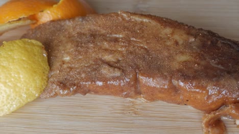 a delicious torrija with a hint of orange peel, lightly glazed and spiced with cinnamon
