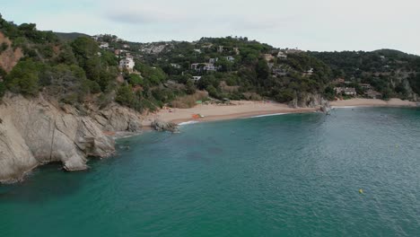 costa brava with these breathtaking aerial images of a hidden beach in gerona