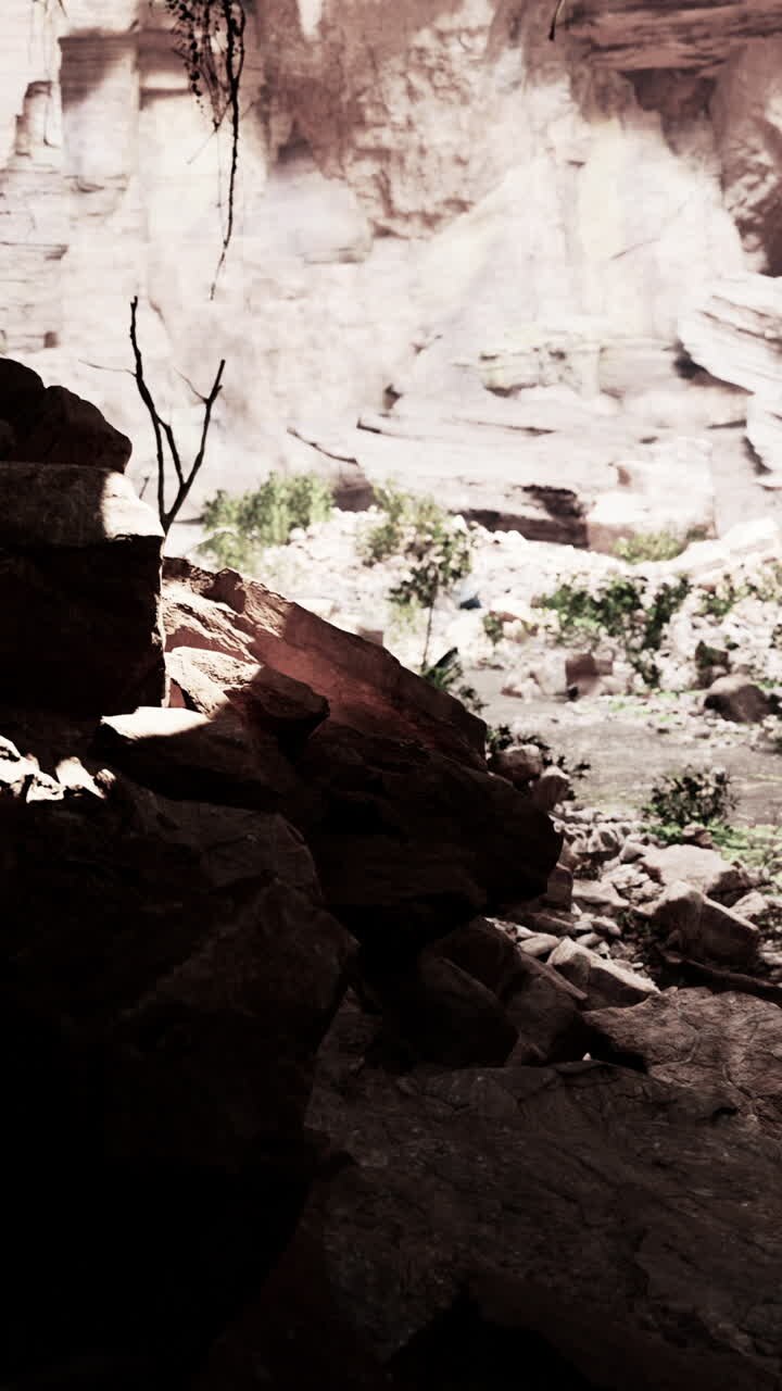 Sunlit Cave Entrance in Arid Landscape