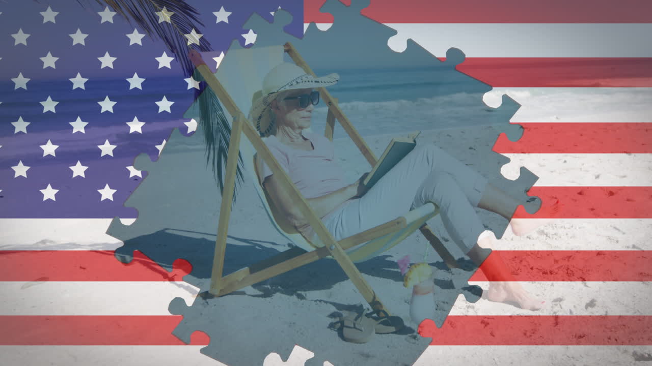 rompecabezas sobre la bandera estadounidense contra una mujer mayor leyendo un libro en la playa
