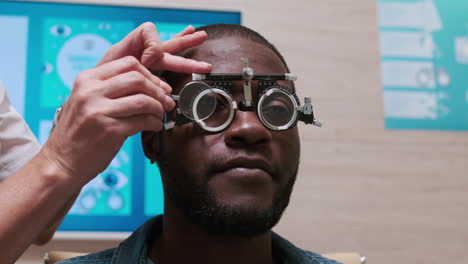 doctor putting lenses on patient