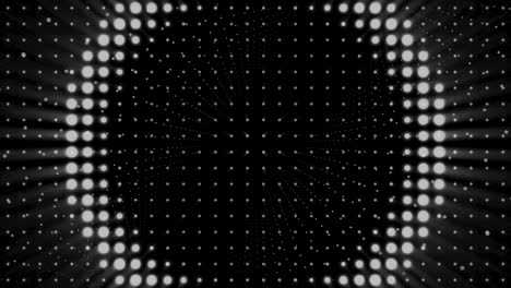 strobe white lights flashing and blinking on black background, seamless loop. animation. wall of spotlights, monochrome, night club illumination concept