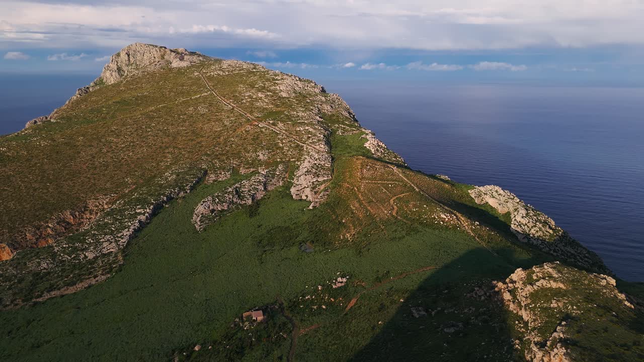 Majestic aerial shot of Monte Monaco, showcasing its rugged cliffs and Mediterranean views