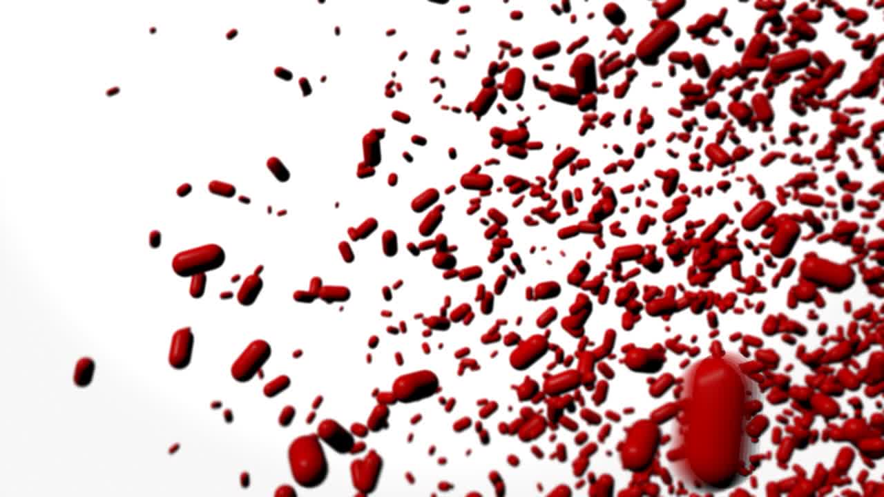 흰색 배경에 날아다니는 빨간 알약