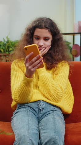 young child kid girl texting share messages content on smartphone social media applications online