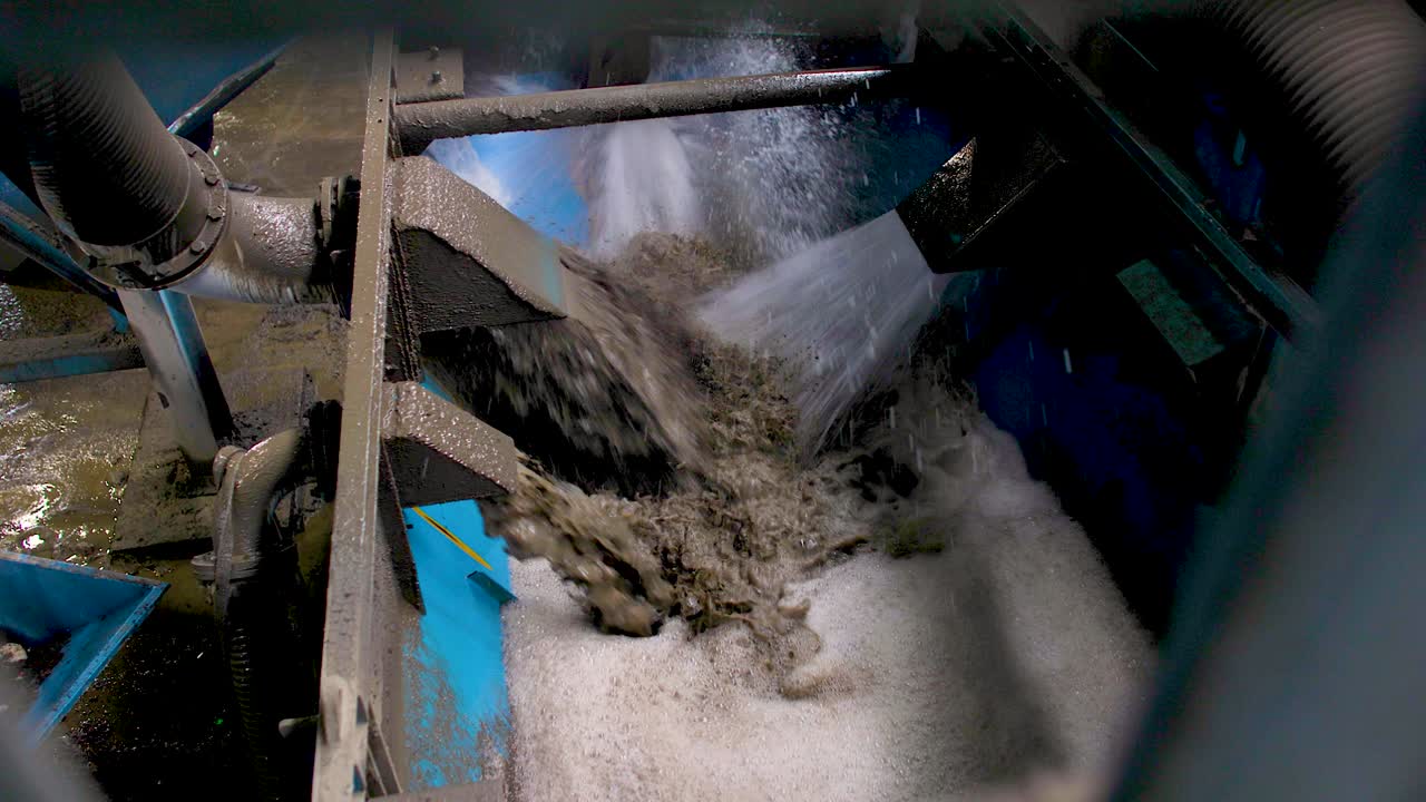 Dirty water processing plant filtrating water flowing through a large duct.