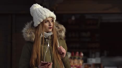 Charming-girl-is-standing-on-the-street