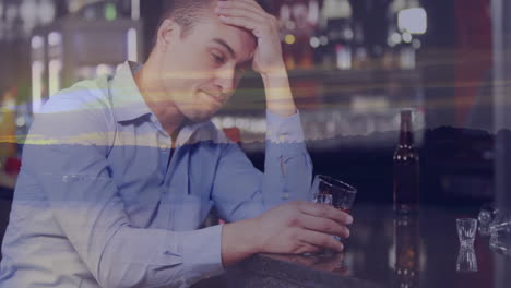holding drink at bar, pensive man with sunset animation in background