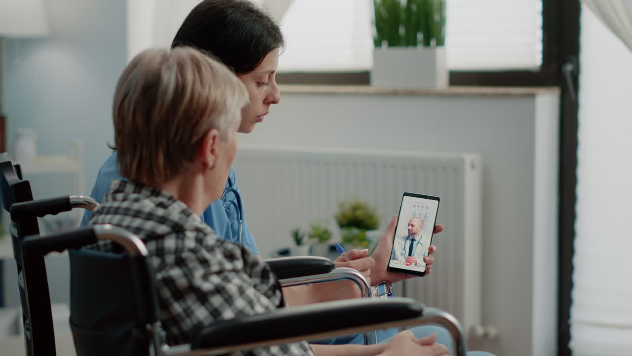 Senior patient talking to doctor on video call