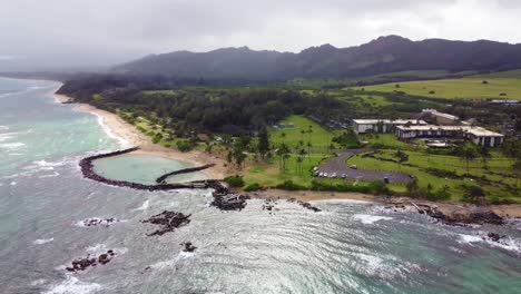 cinematic view of lydgate park pools at lydgate beach park near wailua bay in kauai. holiday in paradise. man made two large tide pools created by lava rock for safely swimming snorkeling