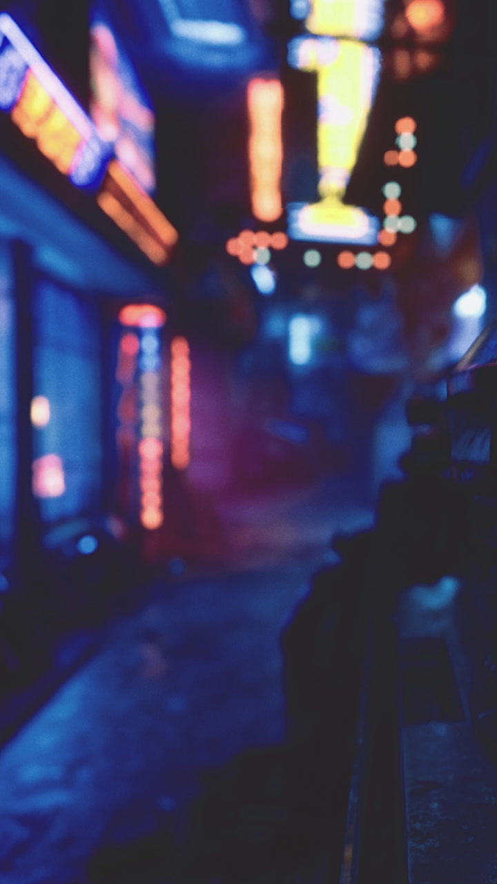 City street at night with neon lights and fog in urban setting