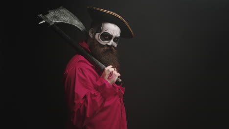 crazy man with make up dressed up like pirate