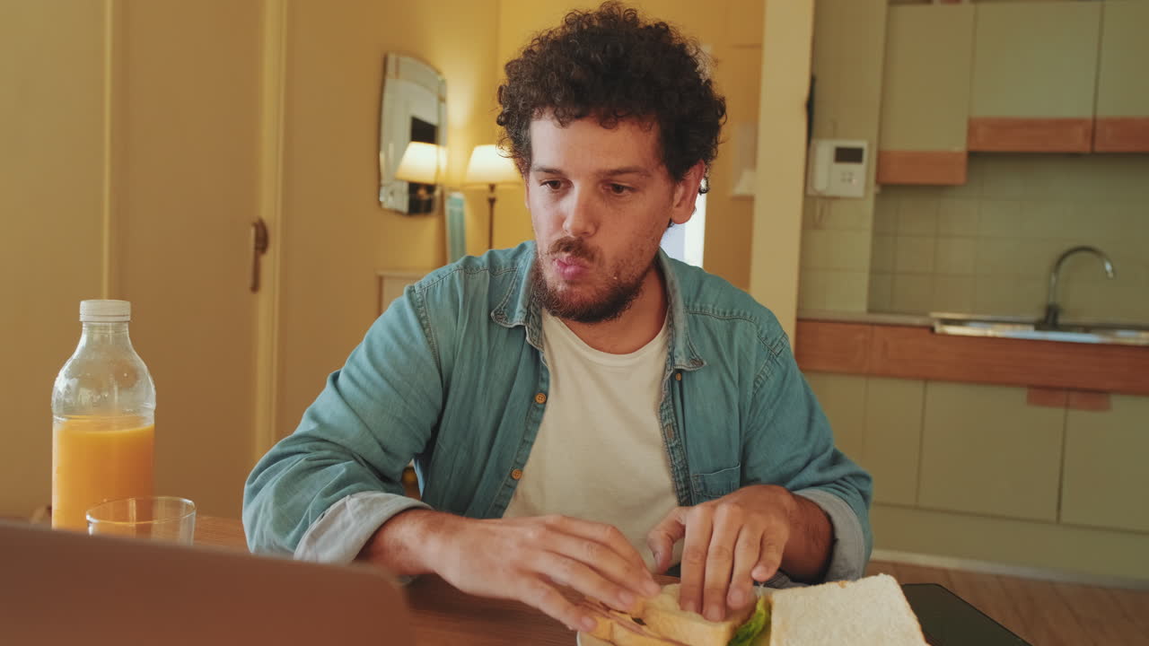 Man Eating a Sandwich