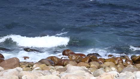 Rocky-shoreline-with-waves-breaking